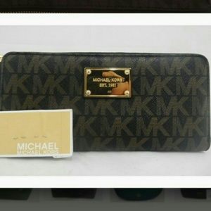MK jet set travel signature