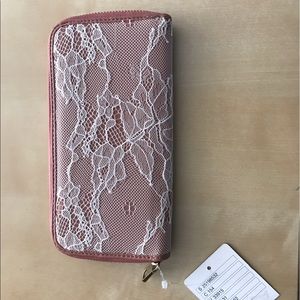 Super cute Kimchi Blue mauve lace wallet.