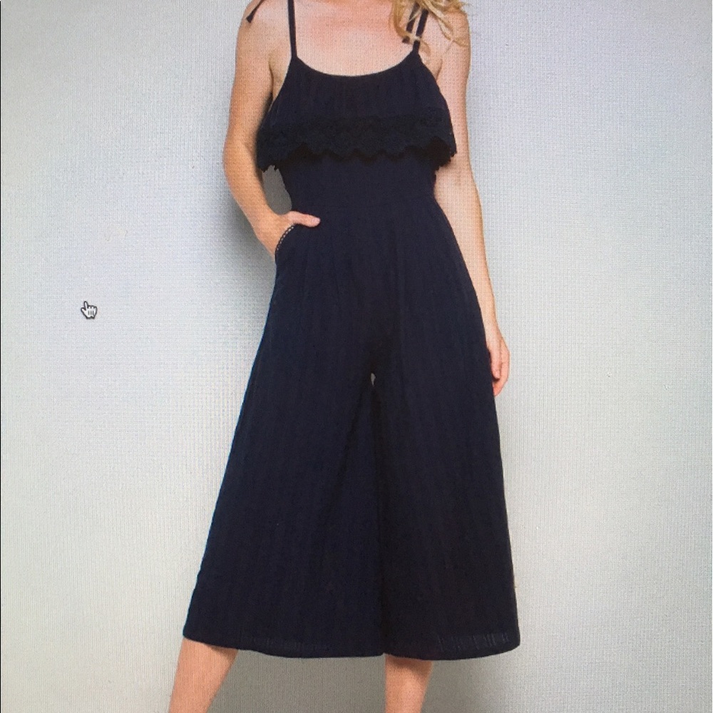 Navy lace ruffle jumpsuit as M