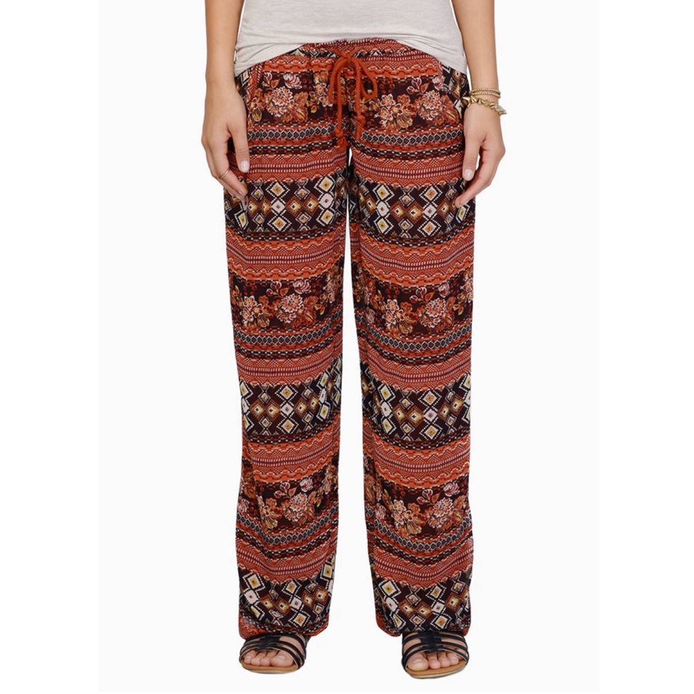 Rust aztec print flowy pants
