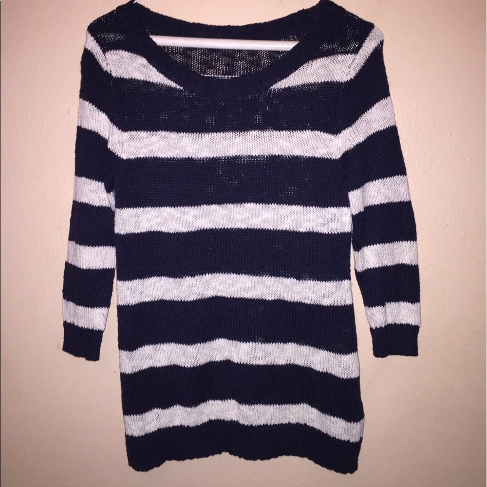 Navy and white sweater.