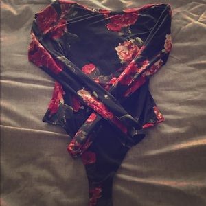 Red and black floral print body suit