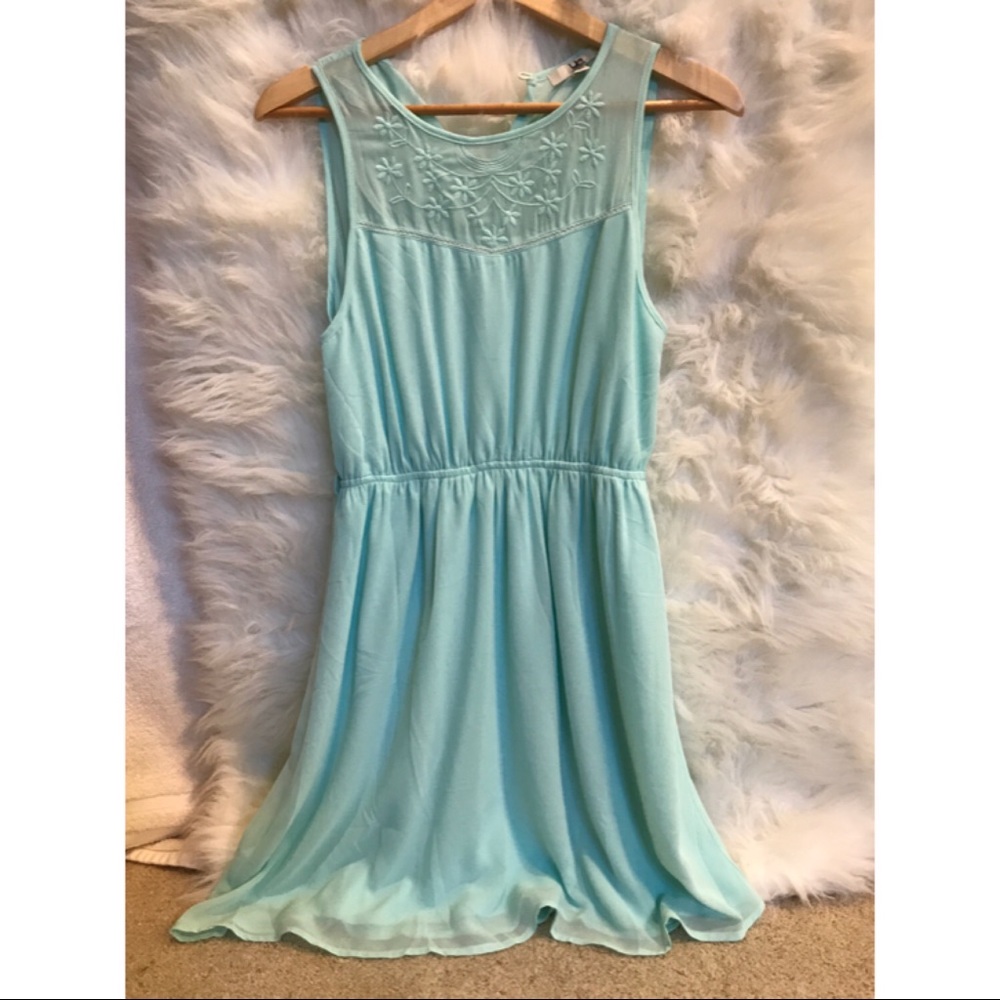 Turquoise dress with embroidery