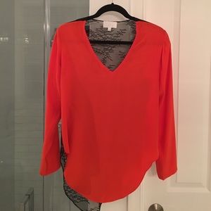 Orange and black lace back Alexis top.