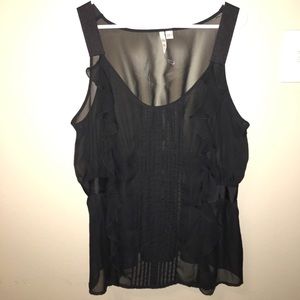 Sheer black tank top cinched at the waist