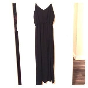 Black maxi dress. Has a slit on left leg