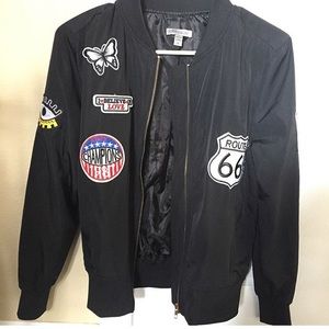 Black bomber jacket with patches