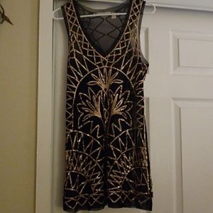 Reposh! Back and gold sequin dress. Gatsby dress