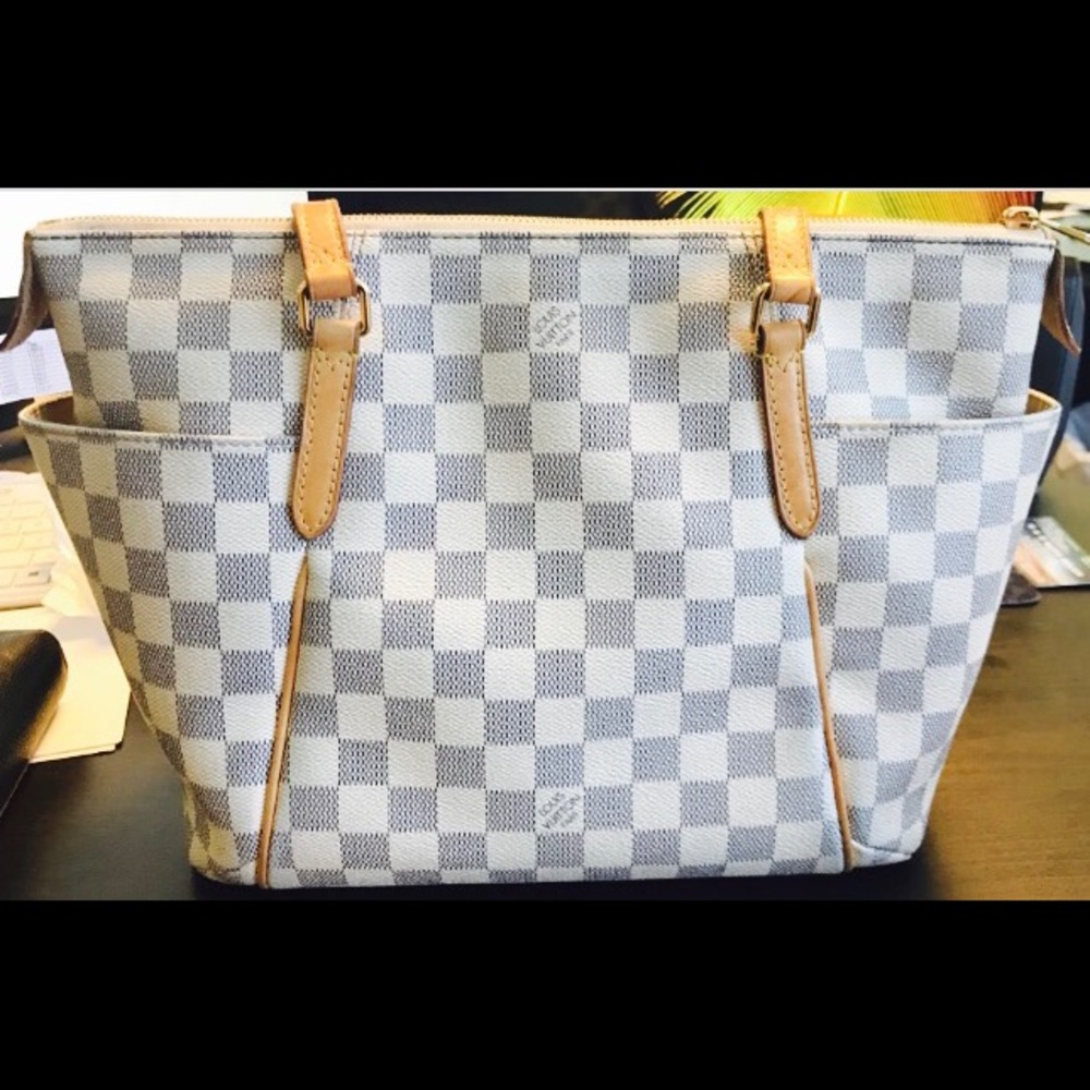 Original/authentic Louis Vuitton canvas tote.