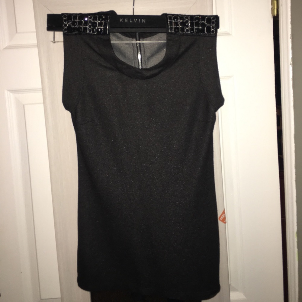 Professional Blouse with jewels on shoulders.
