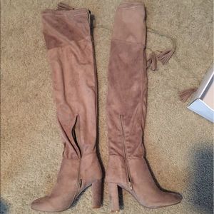 Taupe over the knee suede boots.