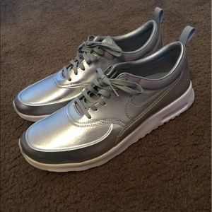 Brand new women's Nike Thea metallic