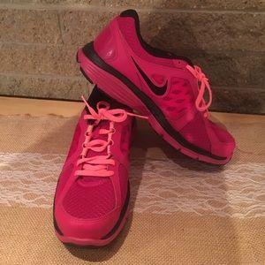 Pink Nike Fitsole tennis shoes