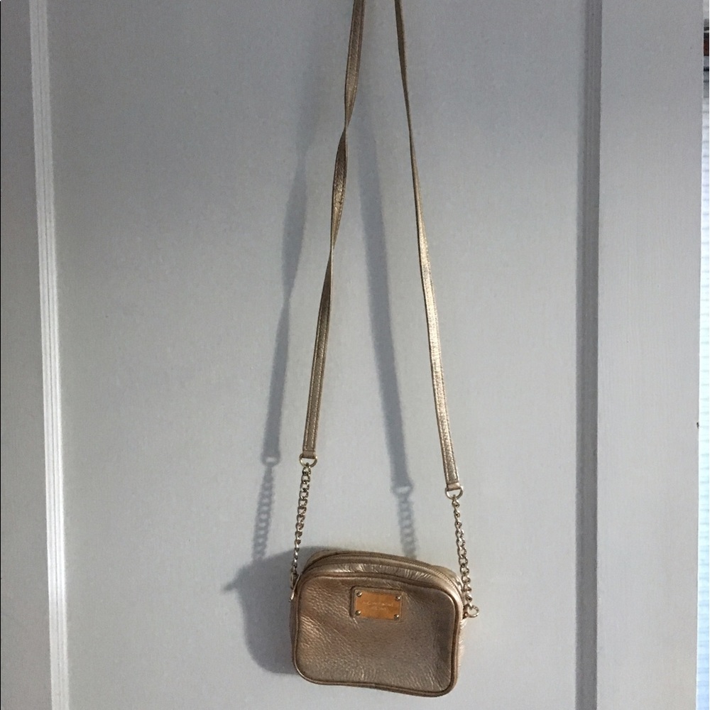 Michael Kohrs gold leather crossbody