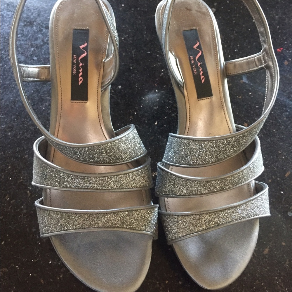 Beautiful and elegant silver Nina sandals.