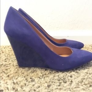 Purple suede wedge pump