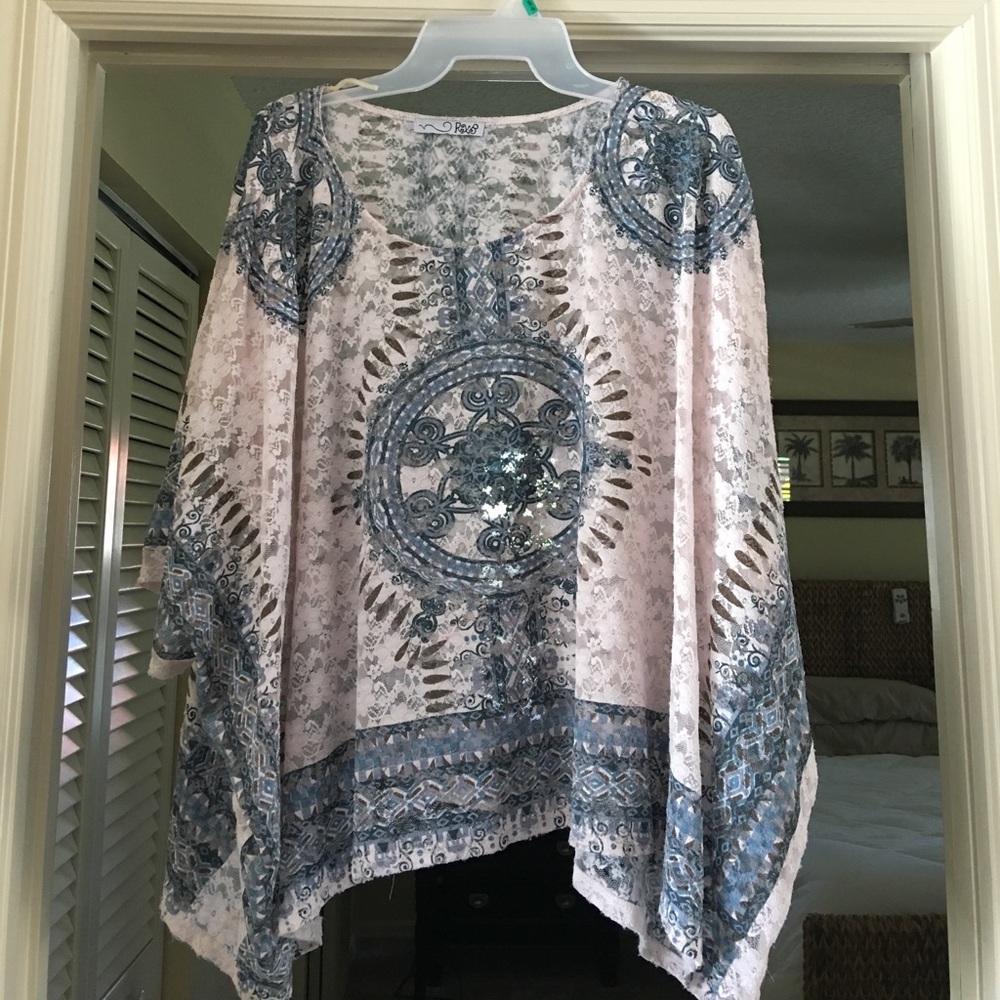 New Lace top in excellent condition.