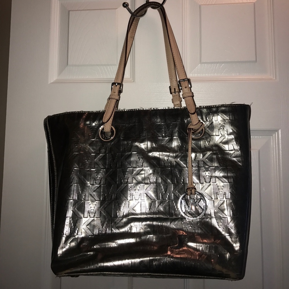 Shiny silver MK designer purse