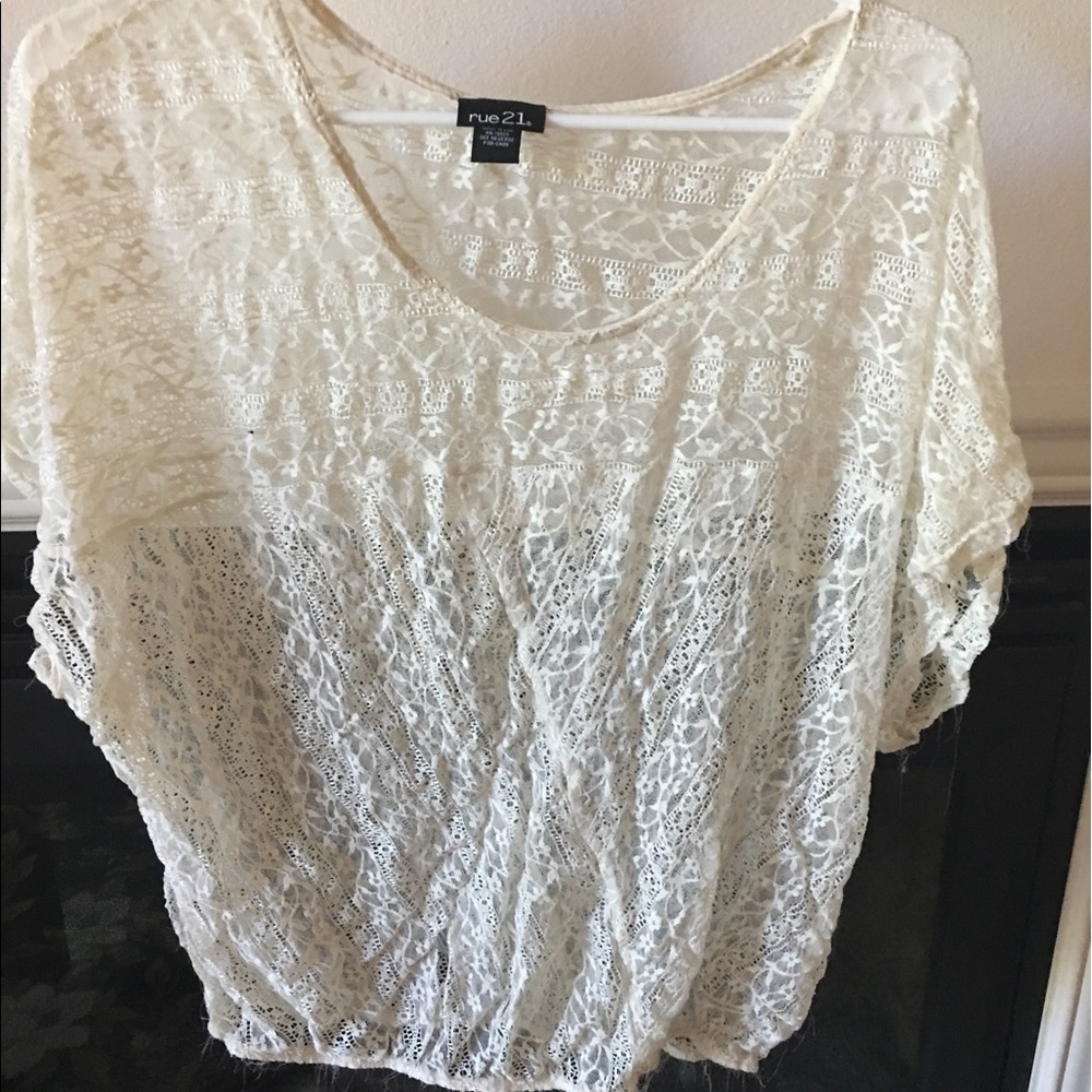 Sheer lace over shirt
