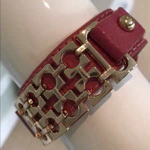 Pink leather bracelet with metal work