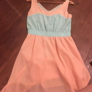 Coral and teal dress.
