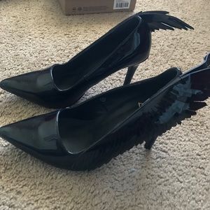 Black winged heels..worn twice..perfect condition