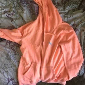 Peach pink zip up jacket , only two years old
