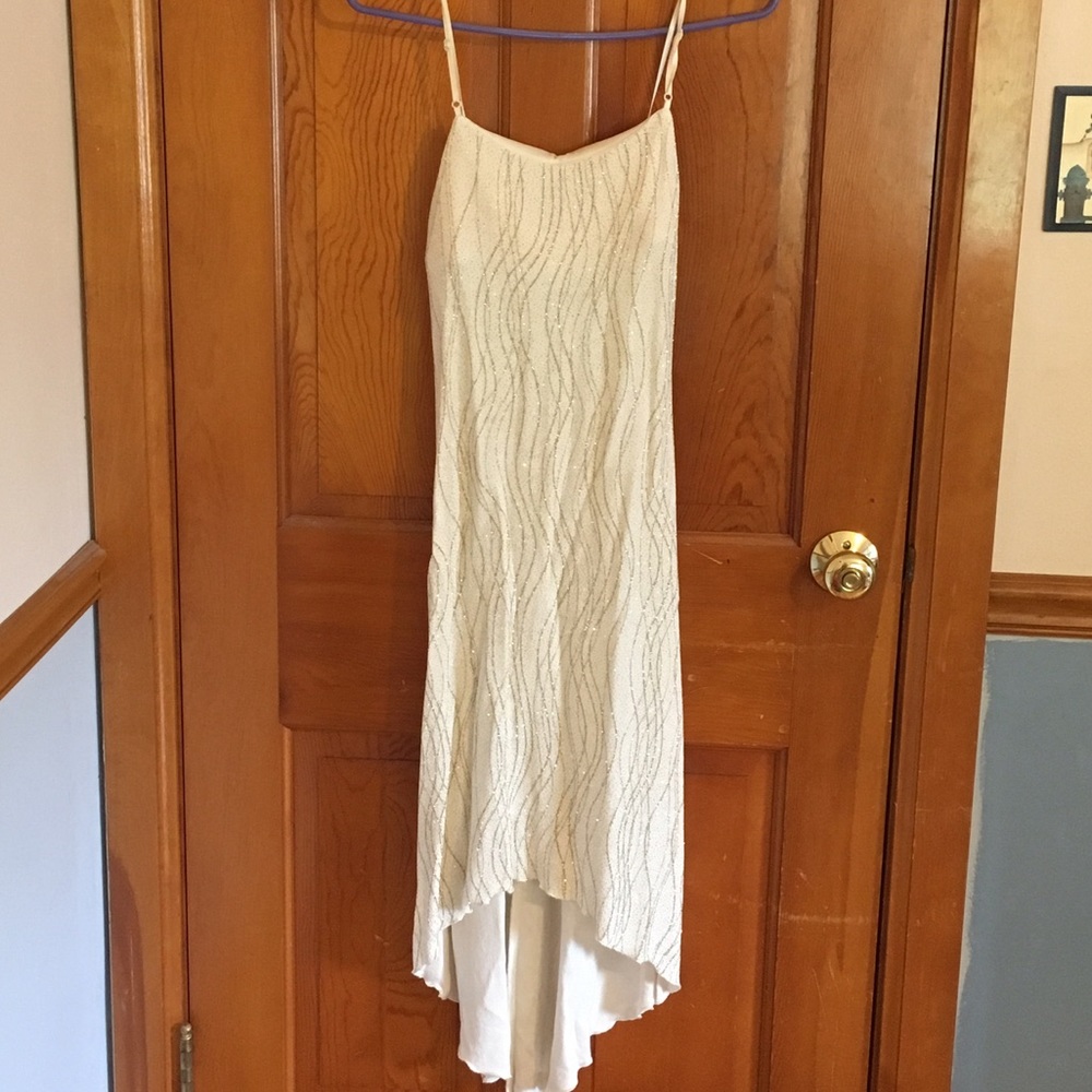 Beautiful dress...cream with gold accents