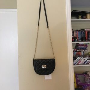 A small black cross body bag