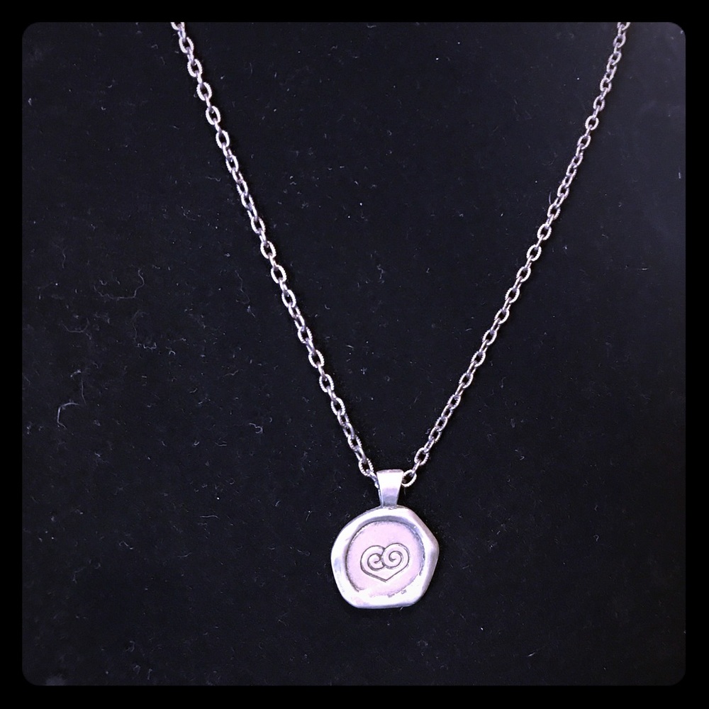 Silver necklace with two sided pendant