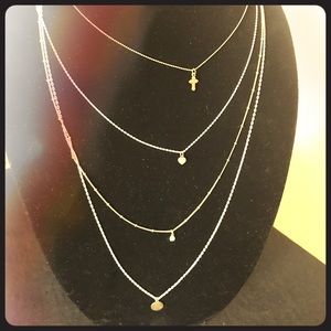 Tiered necklace with charms