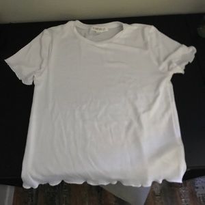 White shirt with ruffled ends