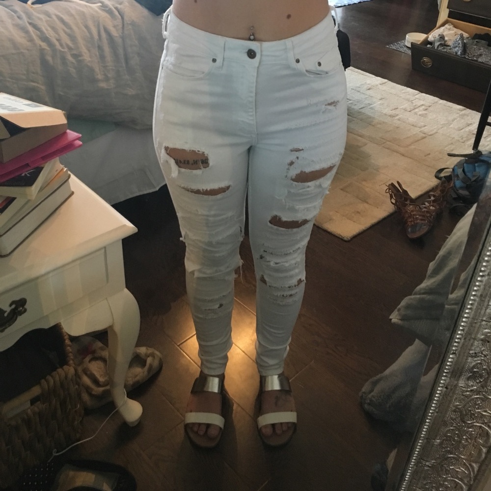 High waisted white ripped jeans