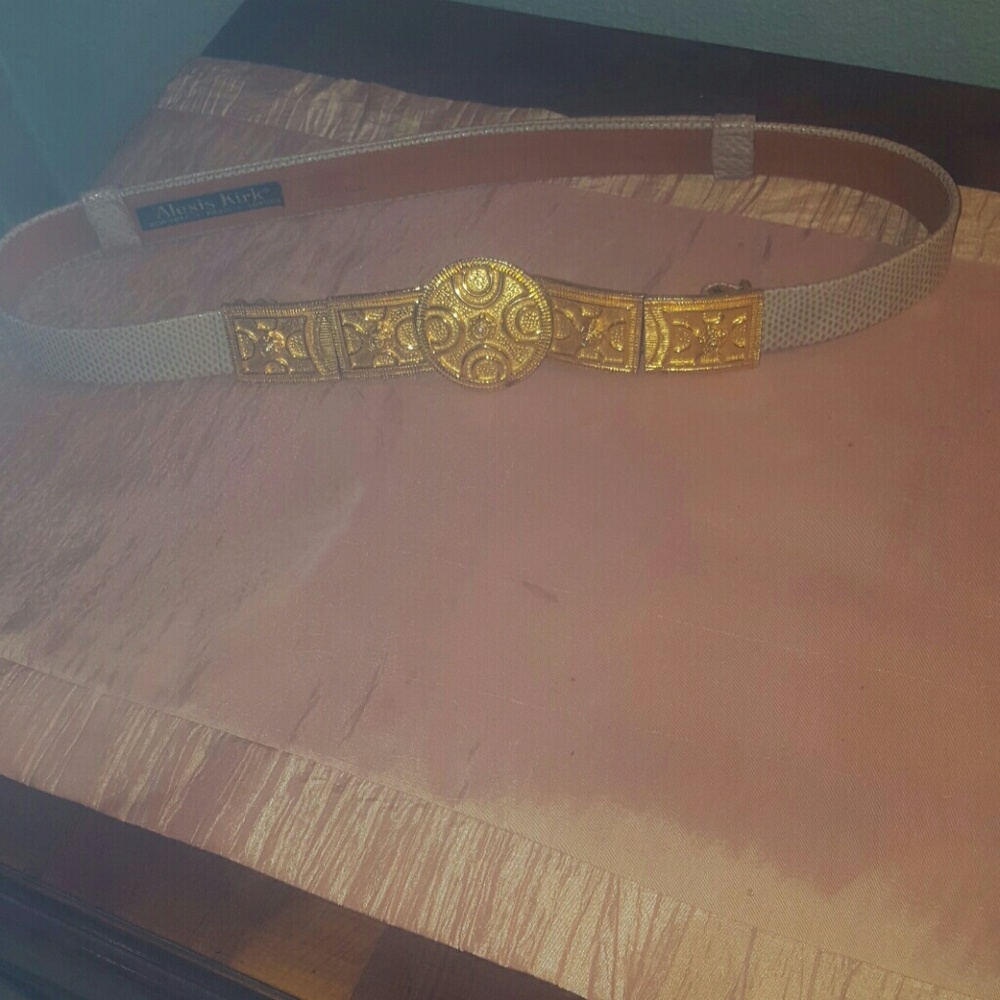 Alexis Kirk adjustable snake skin belt.