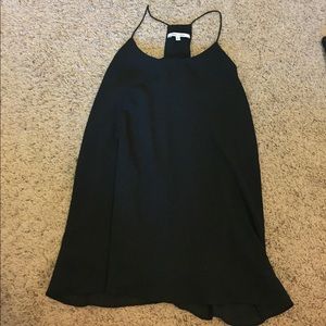 very cute black flowy shirt!