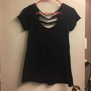 Black shirt with ripped back. Size small.