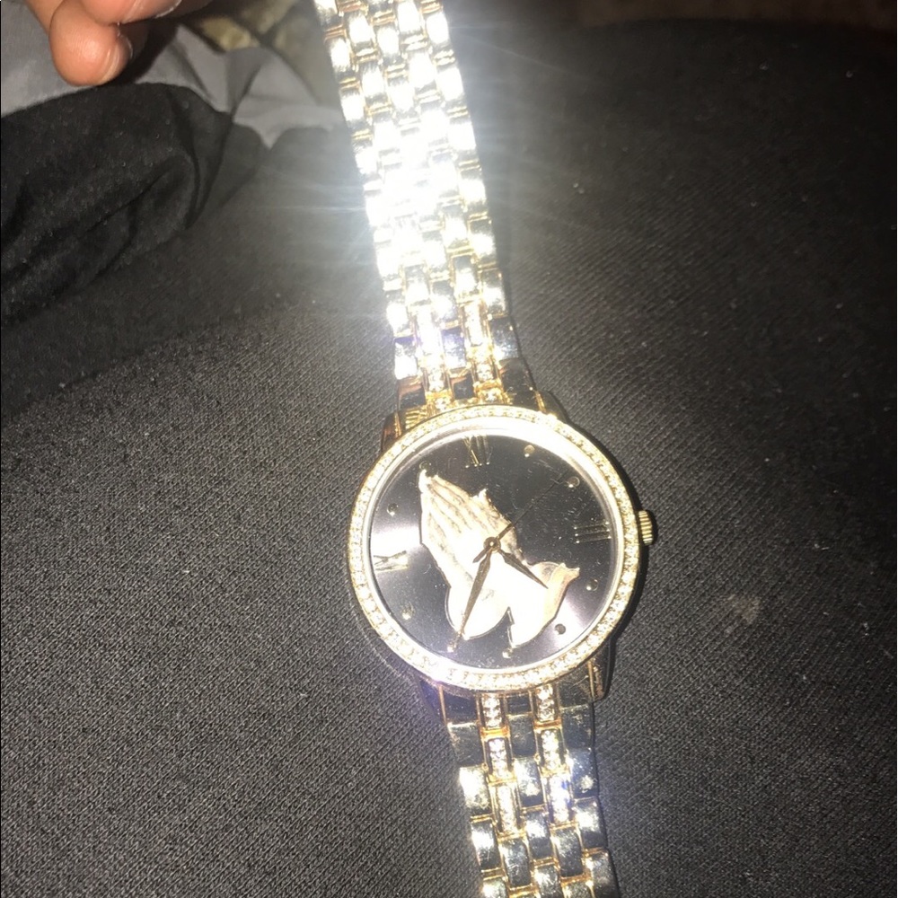Gold praying hands watch