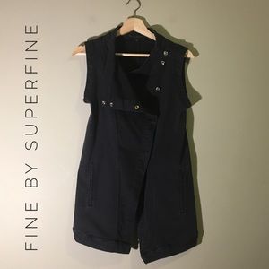 Long black snap up asymmetrical vest