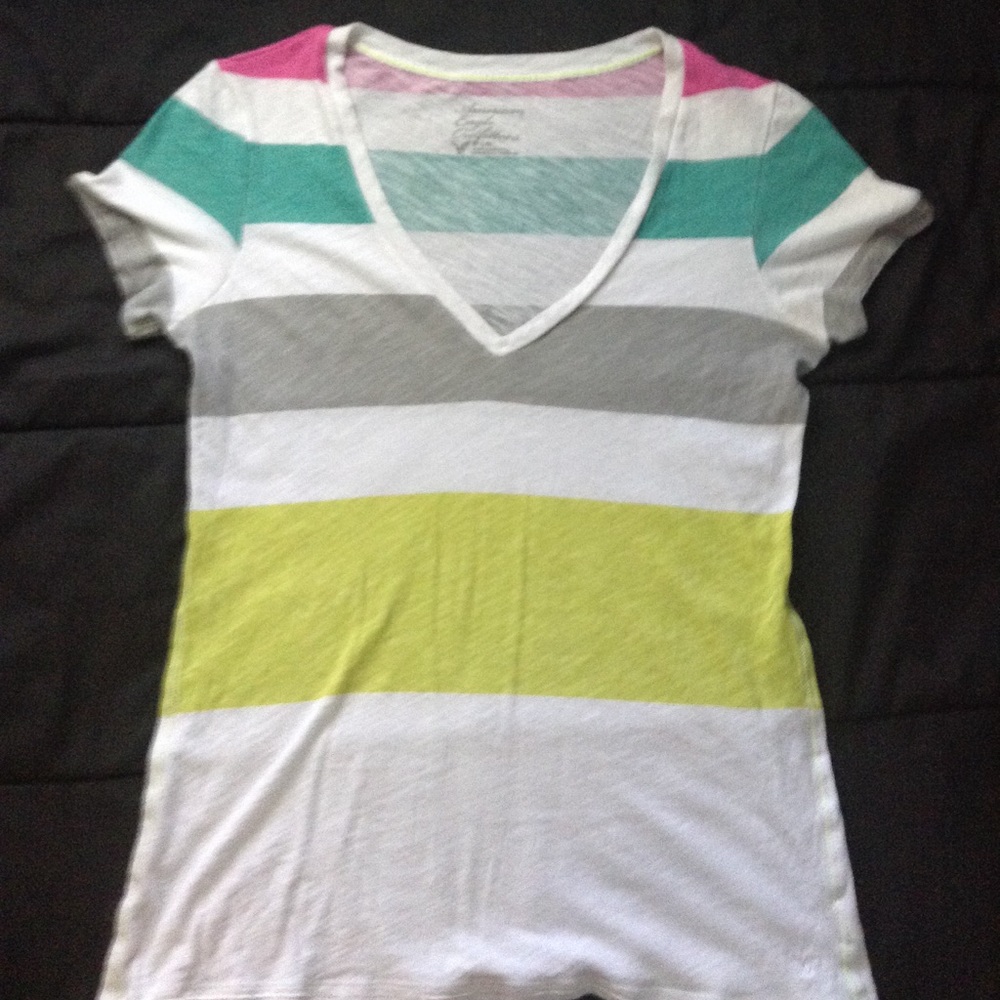 A white shirt with colorful stripes