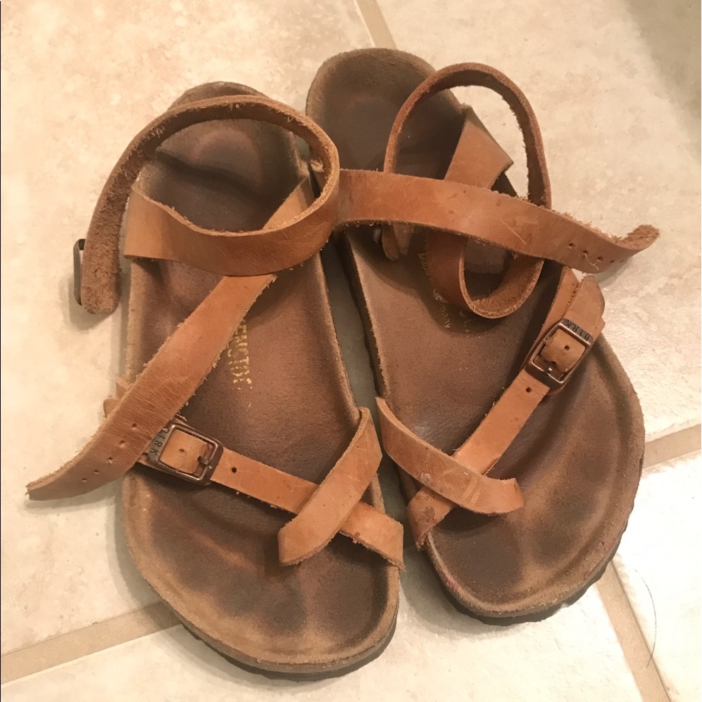 Lightly worn sandals.
