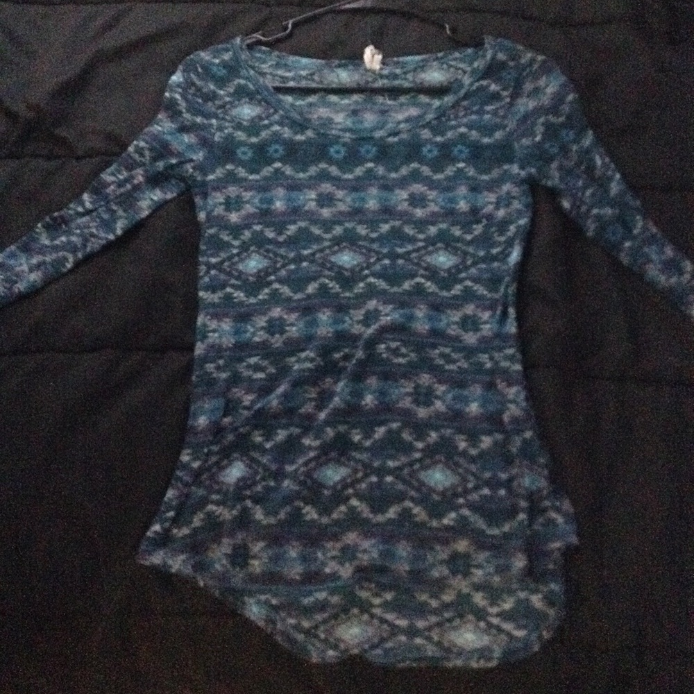 A blue mid sleeve shirt with a pattern