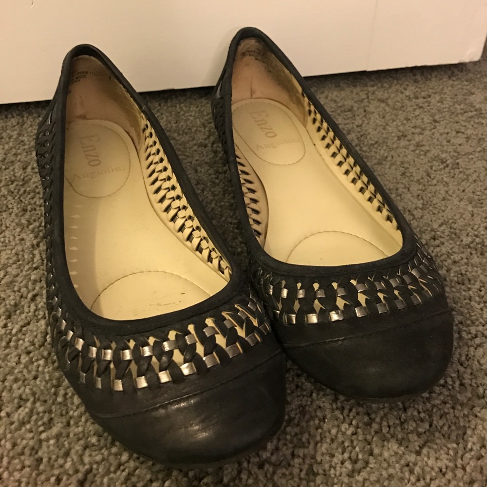 Black and gold rimmed flats