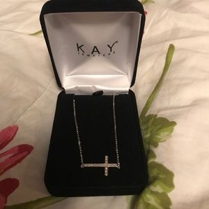 Never worn cross necklace.