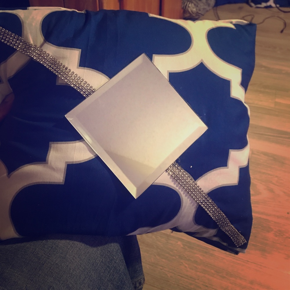 Pillows decorated with mirrors
