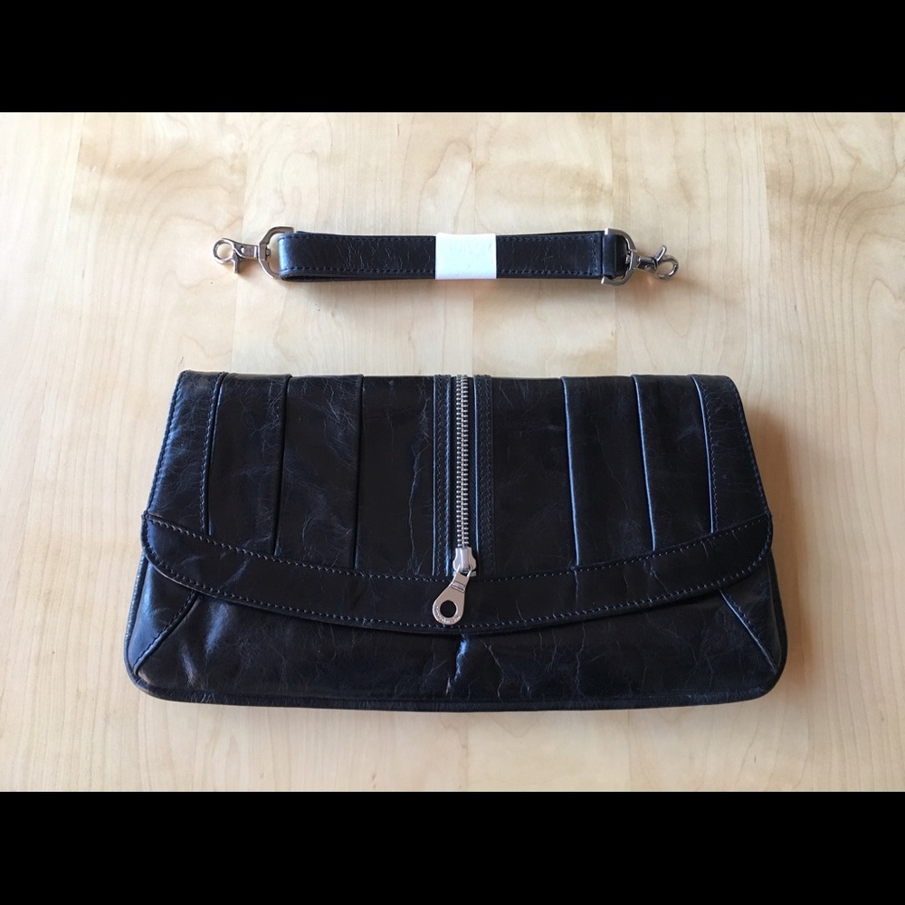 Christopher Kon black leather clutch