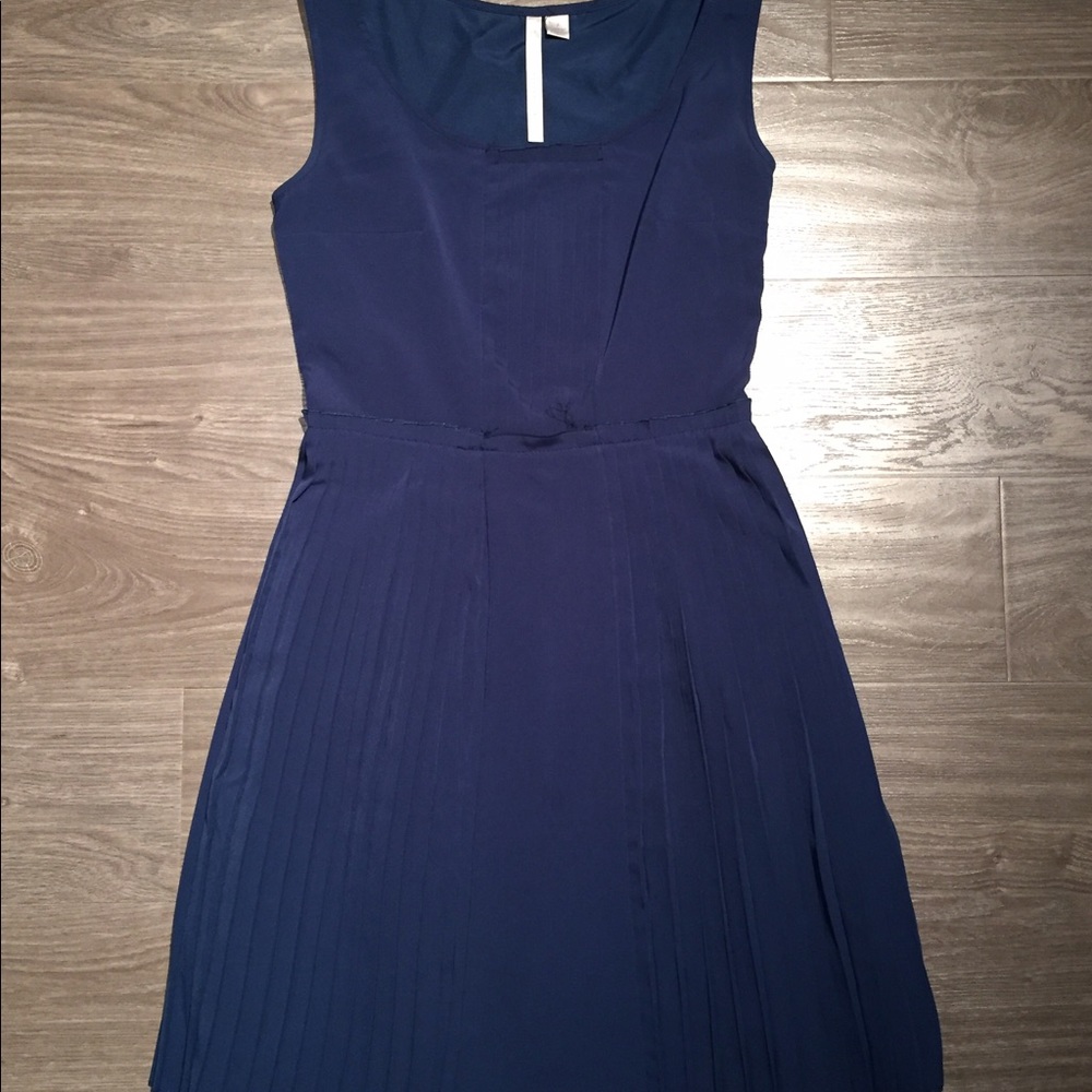 Lauren Conrad. Blue pleated dress.