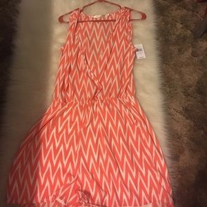 Orange/white chevron romper. NWT.  Never worn.