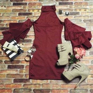 Burgundy ruffled sleeved, cold shoulder dress.