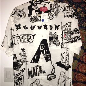 Supreme button down with sticker graphics