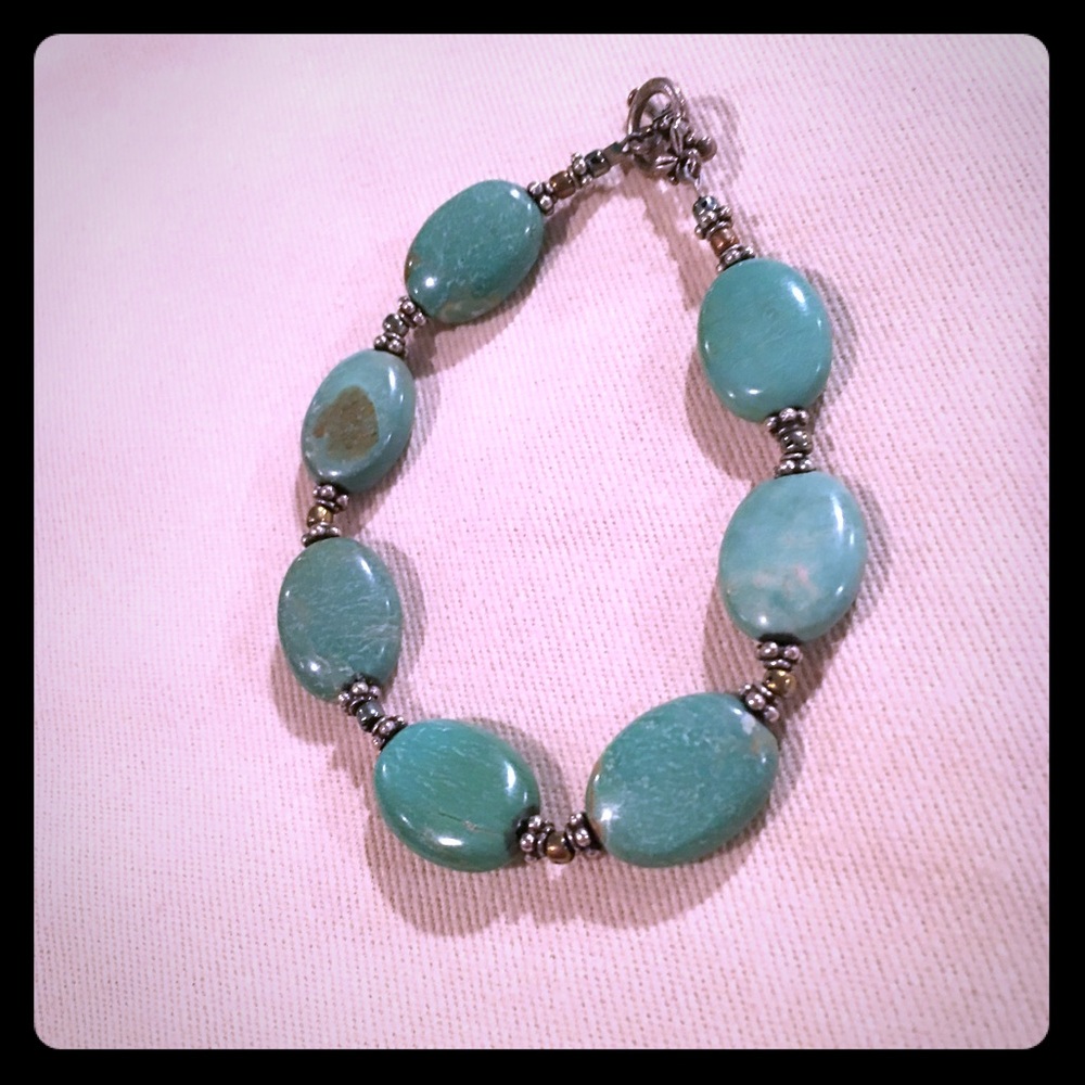 Turquoise bracelet with beautiful loop hole clasp.